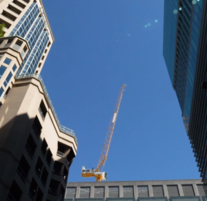 Crane setup between skyscrapers